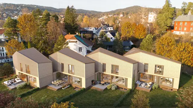 Dronefoto av boligenes fasade. Illustrasjon - avvik vil forekomme.